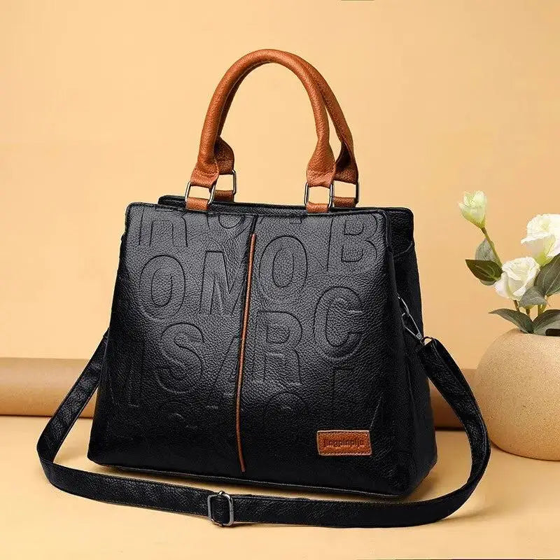 2024 New Fashion Solid Color Shoulder Large Capacity Soft Leather Cloth Letter Embossed Ladies Handbag