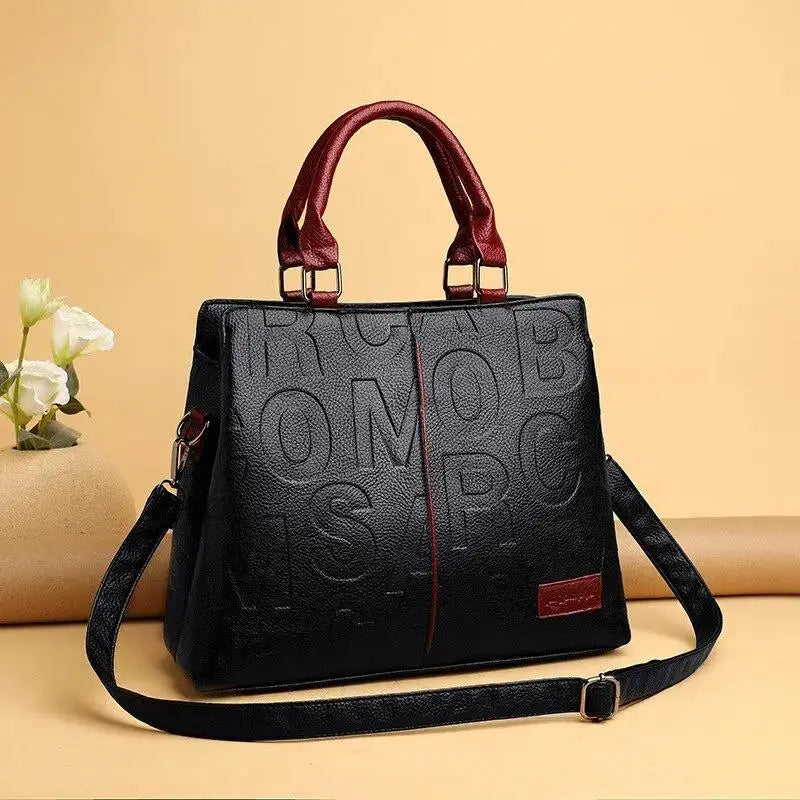 2024 New Fashion Solid Color Shoulder Large Capacity Soft Leather Cloth Letter Embossed Ladies Handbag