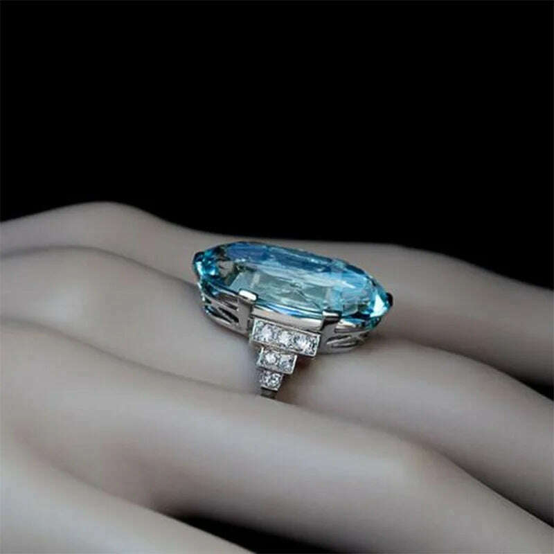 Huitan Female Light Sky Blue Wedding Ring Solitaire Band Oval Stone Engage Party Women Luxury Jewelry Shine CZ Stone Best Gift - KIMLUD